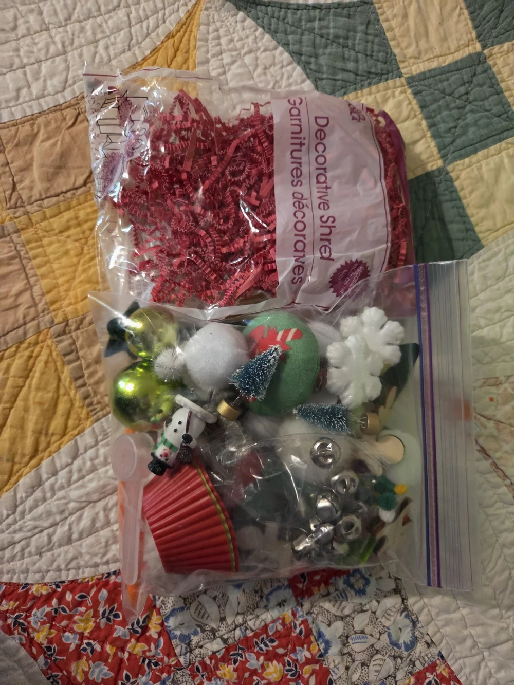 Fun bad of crinkle red paper & Christmas themed sensory bin add ins No Bin Inclu
